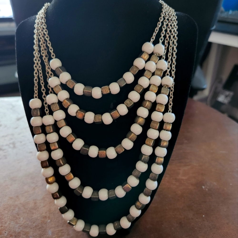 Avenue white and bronze 5 tier clasp necklace 14" long when closed 28" extended.